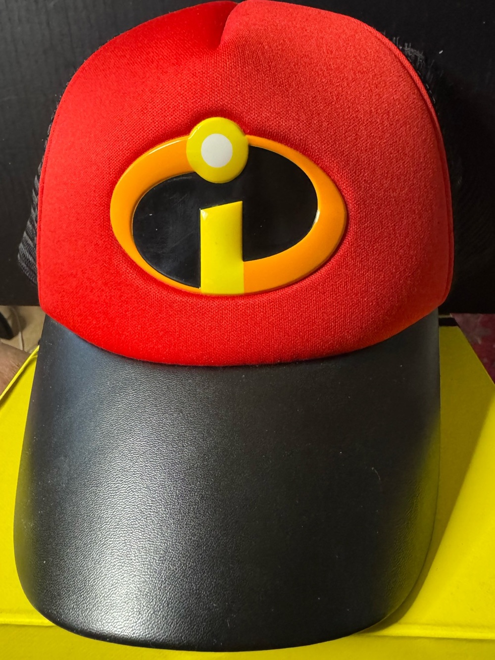 Disney Parks’ The Incredibles Red and Black Logo adjustable Adult Trucker Hat